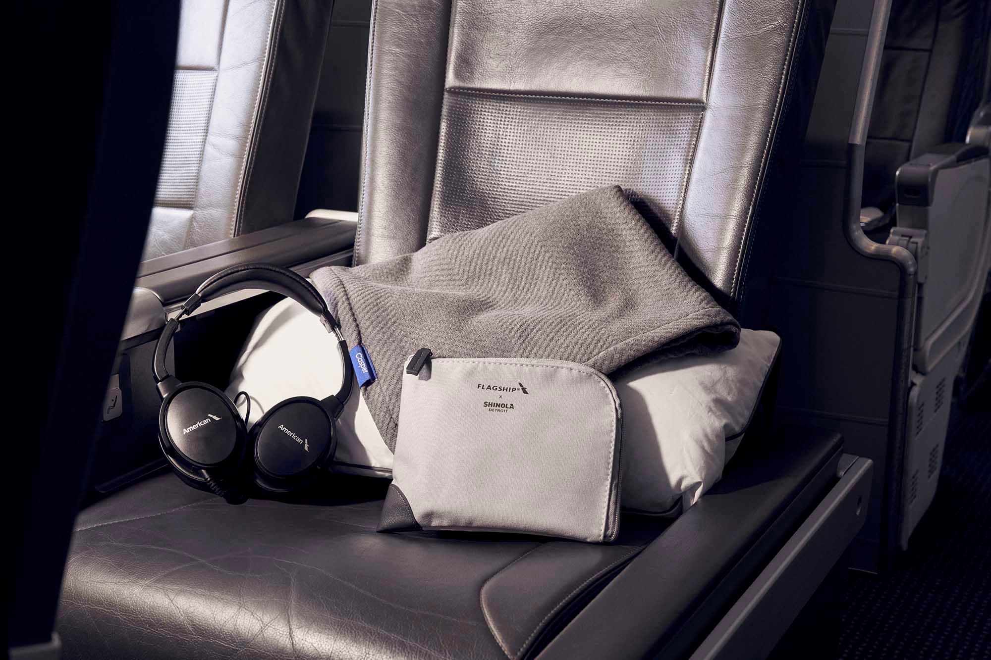 Pillows and sheets placed on airplane seat