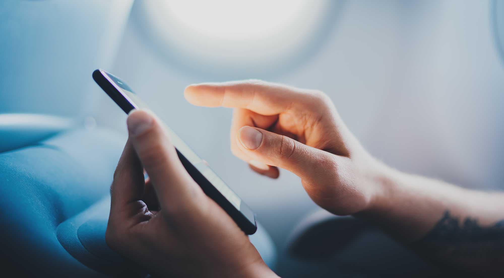 Person interacating with a mobile smartphone